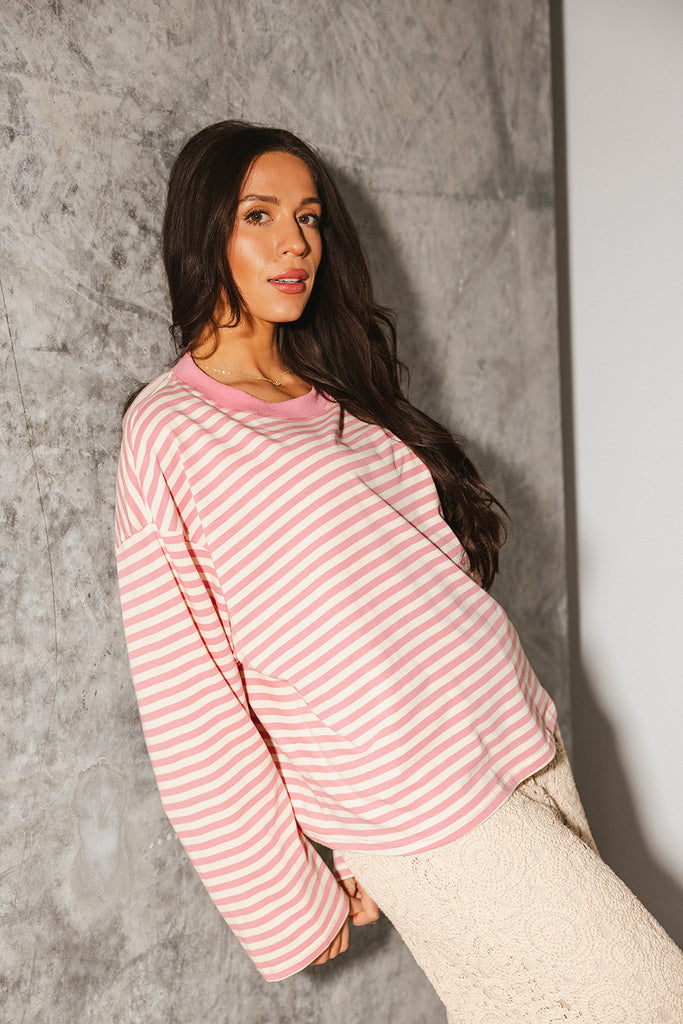 oversized pink striped long sleeve top. the perfect oversized striped t-shirt for concerts, airport outfits, + casual date nights. 
