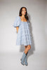 a blue puff sleeve mini dress with lace tiered details + a stretchy square neckline. perfect for family pictures, baby showers, weddings, + special occasions. 
