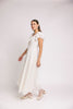 a white vintage-inspired midi dress with a lace ruffle neckline + bow detail. the perfect white dress for bridal showers, rehearsal dinners, + any special occasion.
