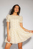 a floral puff sleeve dress with a smocked bodice + mini length. the perfect ditsy floral dress for family pictures, bridal showers, + brunch dates.