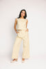 butter yellow pant set with a cropped button up tank + high waisted trousers. the perfect elevated set for the office + everyday wear. 
