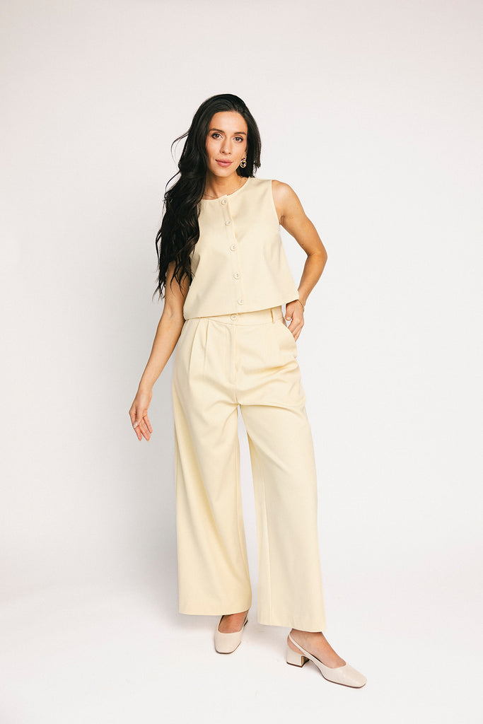 butter yellow pant set with a cropped button up tank + high waisted trousers. the perfect elevated set for the office + everyday wear. 
