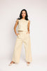 butter yellow pant set with a cropped button up tank + high waisted trousers. the perfect elevated set for the office + everyday wear. 
