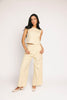 butter yellow pant set with a cropped button up tank + high waisted trousers. the perfect elevated set for the office + everyday wear. 
