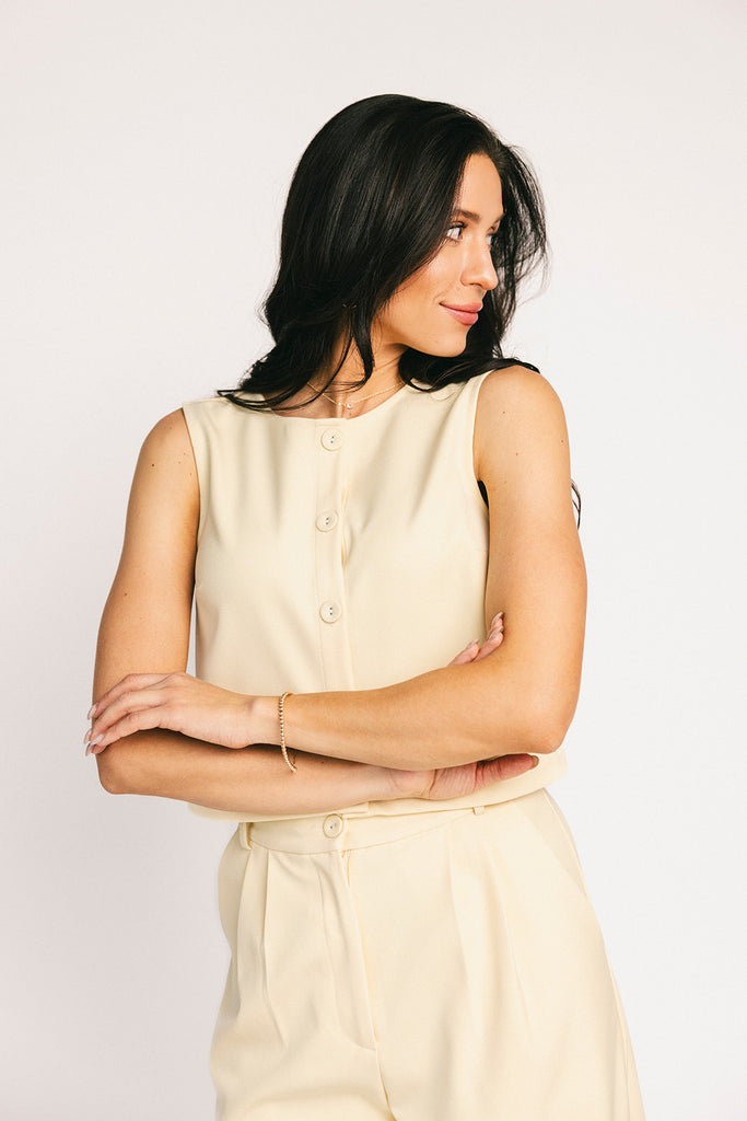 butter yellow pant set with a cropped button up tank + high waisted trousers. the perfect elevated set for the office + everyday wear. 
