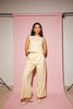 butter yellow pant set with a cropped button up tank + high waisted trousers. the perfect elevated set for the office + everyday wear. 
