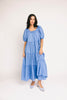zoco daymaker dress: puff sleeve blue maxi dress with an elastic neckline. perfect for weddings, baby showers, and family pictures.
