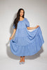 zoco daymaker dress: puff sleeve blue maxi dress with an elastic neckline. perfect for weddings, baby showers, and family pictures.
