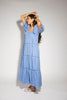 zoco daymaker dress: puff sleeve blue maxi dress with an elastic neckline. perfect for weddings, baby showers, and family pictures.
