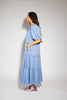 zoco daymaker dress: puff sleeve blue maxi dress with an elastic neckline. perfect for weddings, baby showers, and family pictures.
