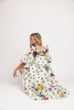 a polka dot puff sleeve dress with floral print details. the perfect polka dot midi dress for baby showers, family pictures, + special occasions. 
