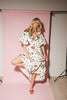 a polka dot puff sleeve dress with floral print details. the perfect polka dot midi dress for baby showers, family pictures, + special occasions. 
