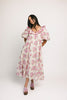 a pink floral puff sleeve dress with a ruffle neckline. the perfect vintage-inspired dress for baby showers, family pictures, + special occasions.
