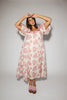 a pink floral puff sleeve dress with a ruffle neckline. the perfect vintage-inspired dress for baby showers, family pictures, + special occasions.
