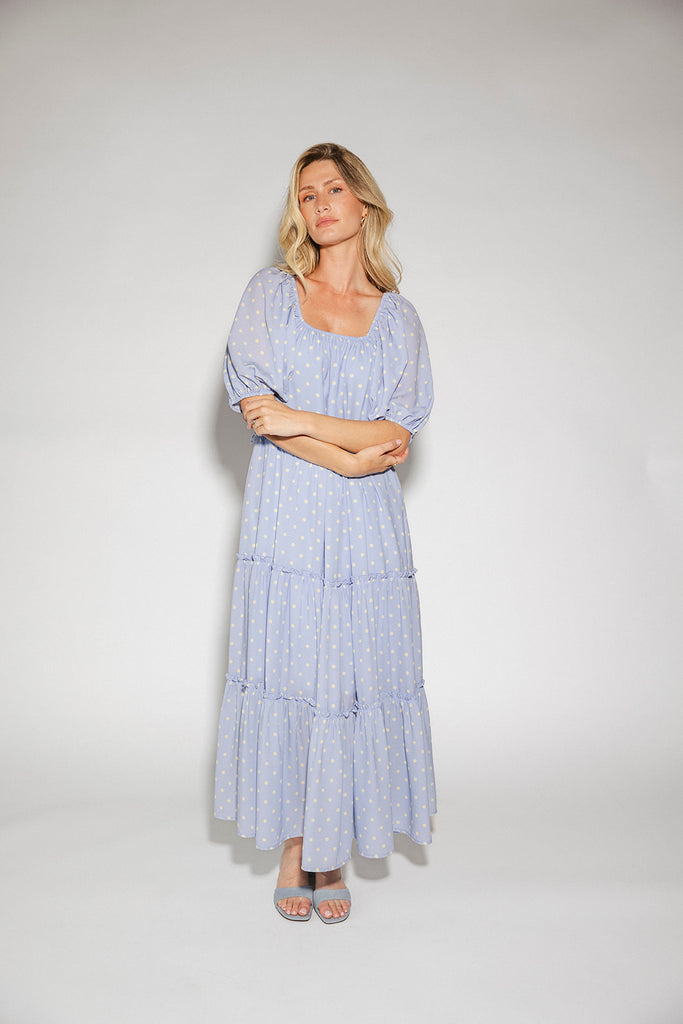 zoco daymaker dress: puff sleeve polka dot dress with an elastic neckline. the perfect blue and yellow polka dot dress for weddings, baby showers, + family pictures.

