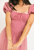 vintage-inspired puff sleeve dress with a square neckline. the perfect red gingham puff sleeve dress for rodeos, family pictures,+ semi-casual occasions.
