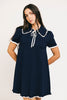 a short sleeve knit mini dress with a ruffled collar + bow detail. the perfect navy knit dress for date nights, family pictures, + everyday wear.
