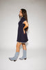 a short sleeve knit mini dress with a ruffled collar + bow detail. the perfect navy knit dress for date nights, family pictures, + everyday wear.
