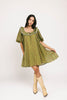 a green floral puff sleeve mini dress with a ruffle neckline. the perfect vintage-inspired dress for baby showers, family pictures, + special occasions. 
