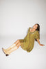 a green floral puff sleeve mini dress with a ruffle neckline. the perfect vintage-inspired dress for baby showers, family pictures, + special occasions. 

