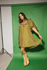 a green floral puff sleeve mini dress with a ruffle neckline. the perfect vintage-inspired dress for baby showers, family pictures, + special occasions. 
