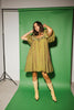 a green floral puff sleeve mini dress with a ruffle neckline. the perfect vintage-inspired dress for baby showers, family pictures, + special occasions. 

