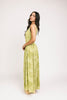 a flowy v-waist green dress with a sleek scoop neckline + subtle floral print. the perfect vintage-inspired maxi dress for weddings, bridal showers, + garden parties.

