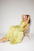 a flowy v-waist green dress with a sleek scoop neckline + subtle floral print. the perfect vintage-inspired maxi dress for weddings, bridal showers, + garden parties.
