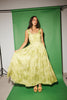 a flowy v-waist green dress with a sleek scoop neckline + subtle floral print. the perfect vintage-inspired maxi dress for weddings, bridal showers, + garden parties.
