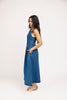 a vintage-inspired denim dress with a boat neckline + a v-shaped waistline. the perfect denim midi dress for family pictures, brunch dates, + special occasions. 
