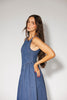 a vintage-inspired denim dress with a boat neckline + a v-shaped waistline. the perfect denim midi dress for family pictures, brunch dates, + special occasions. 
