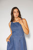 a vintage-inspired denim dress with a boat neckline + a v-shaped waistline. the perfect denim midi dress for family pictures, brunch dates, + special occasions. 
