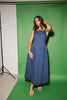 a vintage-inspired denim dress with a boat neckline + a v-shaped waistline. the perfect denim midi dress for family pictures, brunch dates, + special occasions. 

