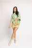 light green short sleeve cardigan with a slouchy, relaxed fit. perfect for casual outfits + lightweight layering.
