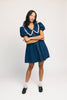 a puff sleeve denim dress with a lace trimmed collar detail. the perfect denim mini dress for date nights, family pictures, + everyday wear.
