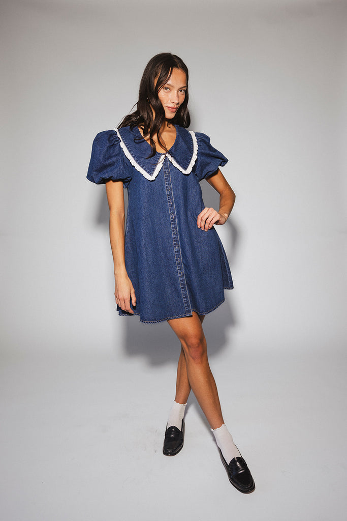 a puff sleeve denim dress with a lace trimmed collar detail. the perfect denim mini dress for date nights, family pictures, + everyday wear.
