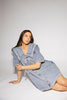 vintage-inspired short sleeve denim dress with an oversized collar + bow detail. the perfect denim mini dress for date nights, family pictures, + everyday wear.
