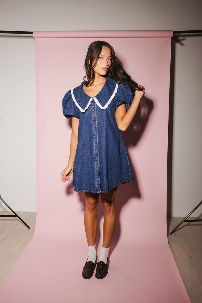 a puff sleeve denim dress with a lace trimmed collar detail. the perfect denim mini dress for date nights, family pictures, + everyday wear.
