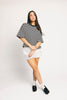 oversized black and white striped t-shirt for women. the perfect boxy striped tee for concerts, airport outfits, + casual date nights.
