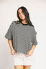 oversized black and white striped t-shirt for women. the perfect boxy striped tee for concerts, airport outfits, + casual date nights.
