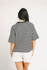 oversized black and white striped t-shirt for women. the perfect boxy striped tee for concerts, airport outfits, + casual date nights.

