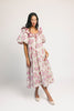 a pink floral puff sleeve dress with a ruffle neckline. the perfect vintage-inspired dress for baby showers, family pictures, + special occasions.
