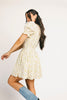 a floral puff sleeve dress with a smocked bodice + mini length. the perfect ditsy floral dress for family pictures, bridal showers, + brunch dates.