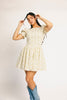 a floral puff sleeve dress with a smocked bodice + mini length. the perfect ditsy floral dress for family pictures, bridal showers, + brunch dates.