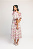 a pink floral puff sleeve dress with a ruffle neckline. the perfect vintage-inspired dress for baby showers, family pictures, + special occasions.

