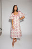 a pink floral puff sleeve dress with a ruffle neckline. the perfect vintage-inspired dress for baby showers, family pictures, + special occasions.
