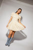 a floral puff sleeve dress with a smocked bodice + mini length. the perfect ditsy floral dress for family pictures, bridal showers, + brunch dates.