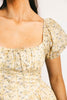 vintage-inspired puff sleeve dress with a muted yellow floral pattern. the perfect puff sleeve midi dress for weddings, bridal showers, + semi-formal events.