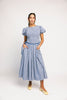 a puff sleeve blue gingham dress with a smocked bodice + side tie details. the perfect vintage-inspired dress for family pictures, weddings, + special occasions. 
