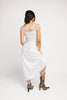 a white satin midi dress with lace detailing + a fitted silhouette. the perfect short sleeve occasion dress for weddings, bridal showers, + dinner parties.
